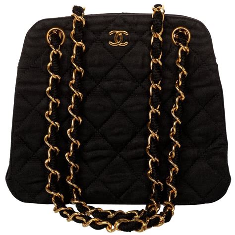 chanel black bag gold chain|Chanel quilted handbag gold chain.